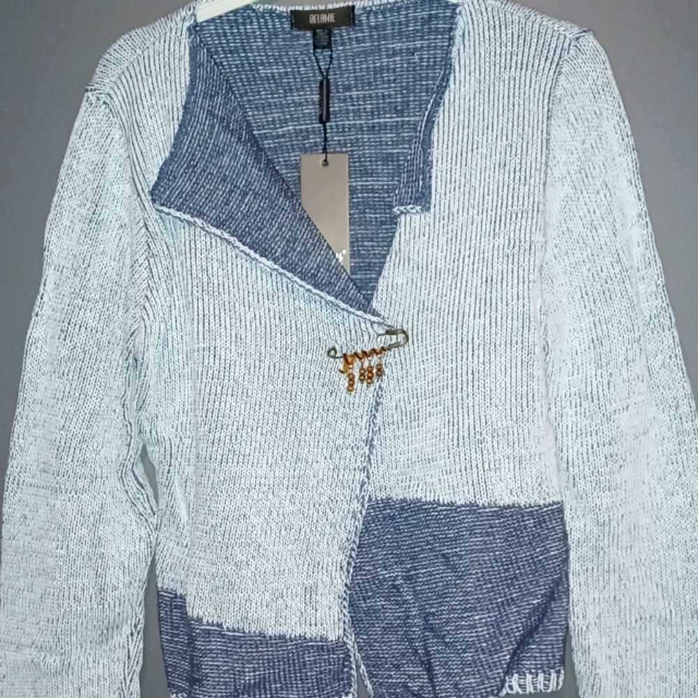 Light blue knit sweater.